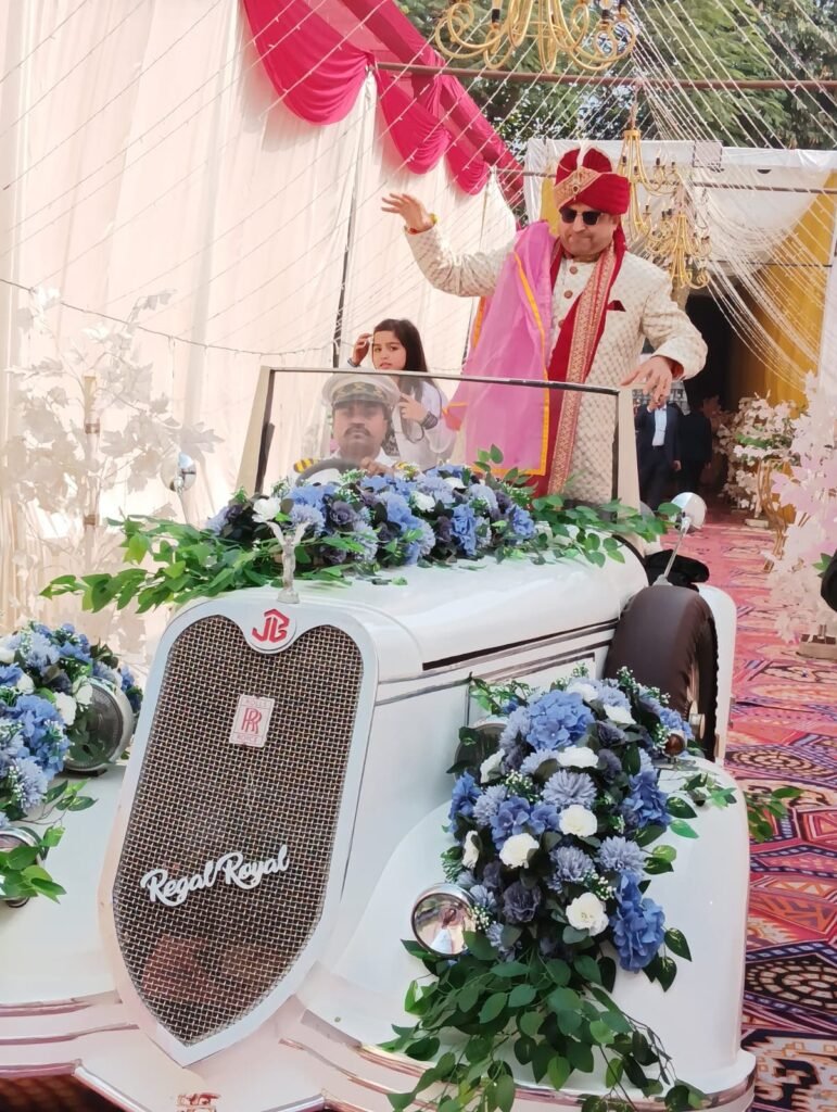 White vintage car, Lucknow wedding, grand entrance, photo moment.