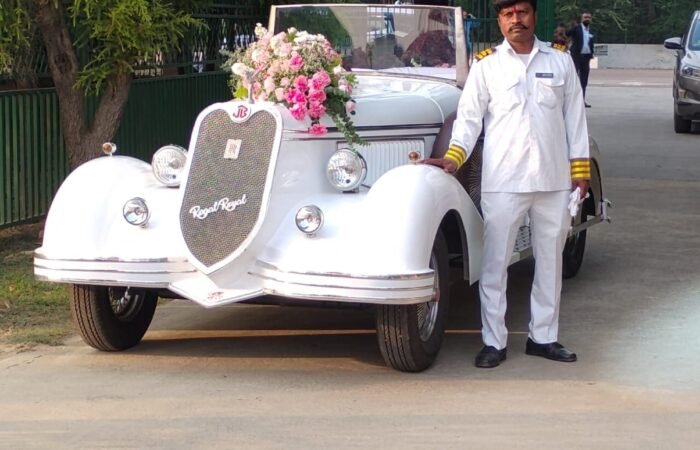 White vintage car, Lucknow outdoor photoshoot, sunny day.