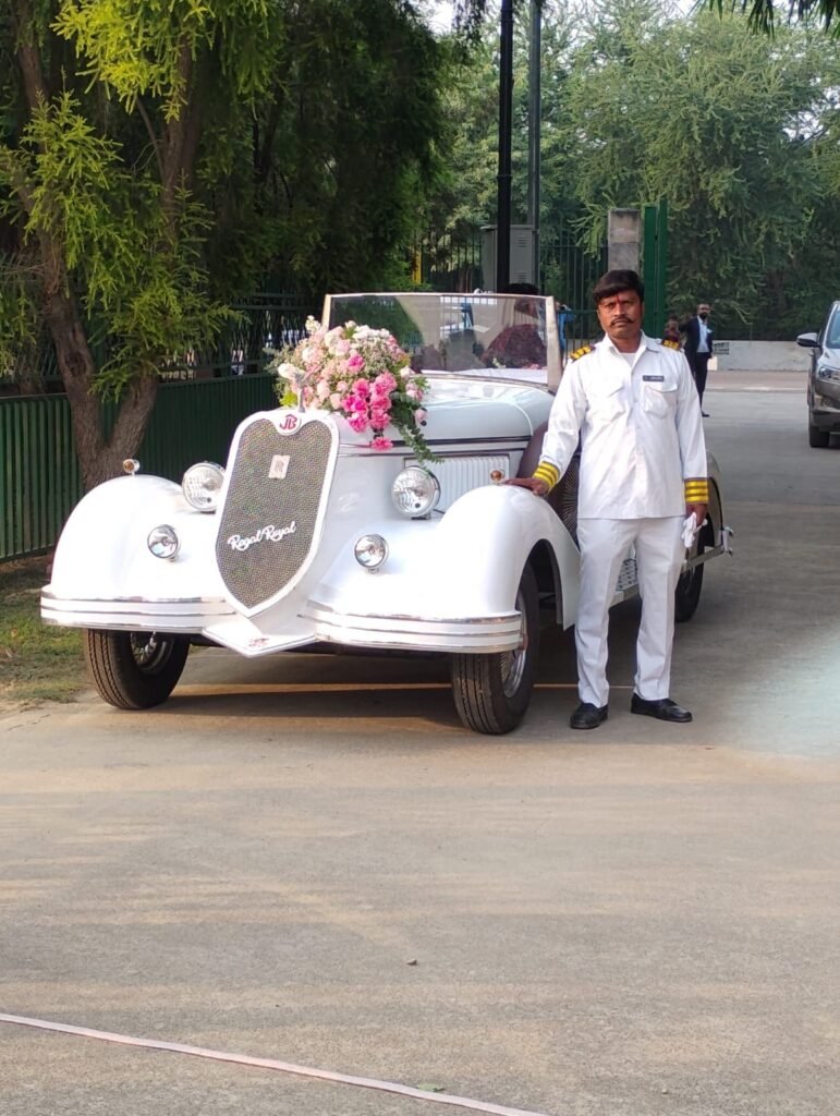 White vintage car, Lucknow outdoor photoshoot, sunny day.