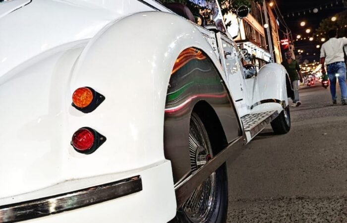 White vintage car, Lucknow wedding procession.